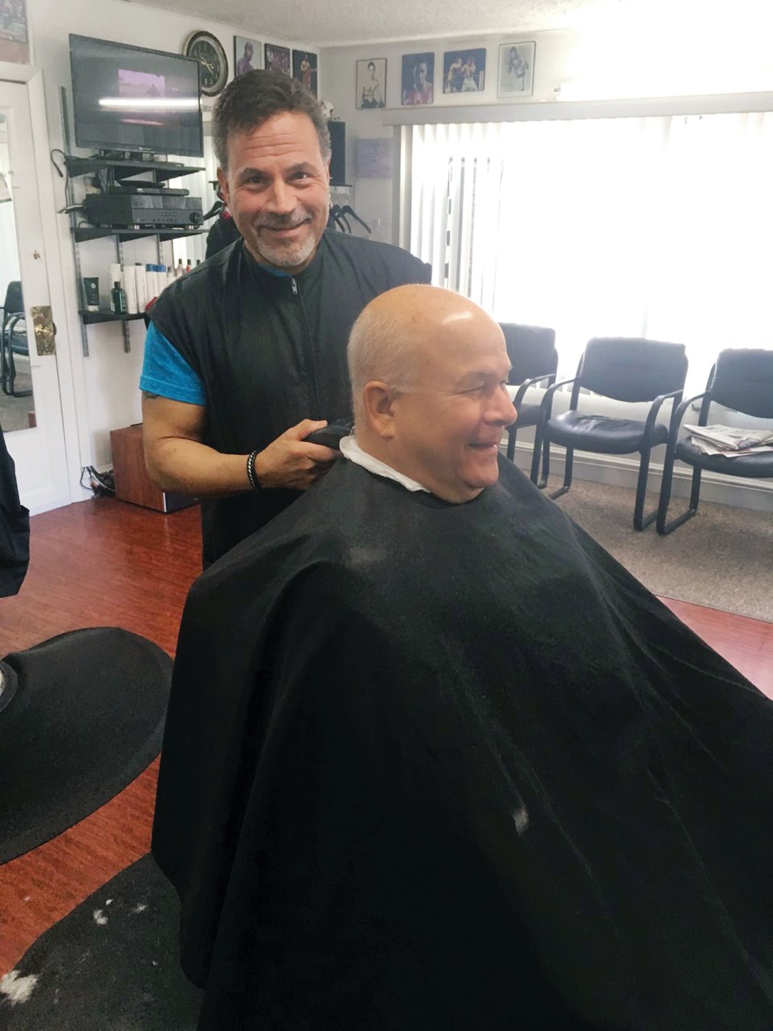 Dave Picozzi, the owner and namesake of David’s Greenwood Barber Shop on Post Road is as busy as ever making his longtime and loyal customers look and feel the very best.